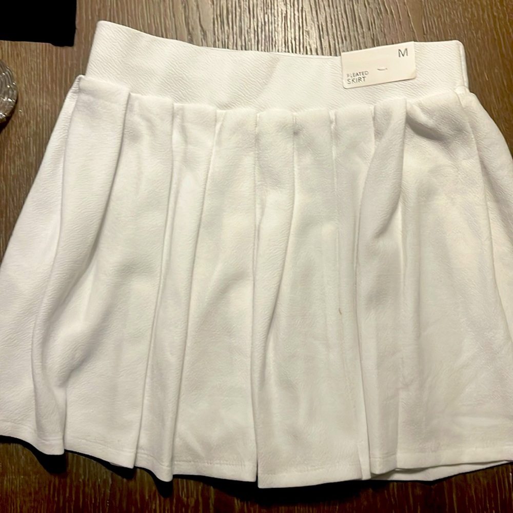 White pleated skirt
